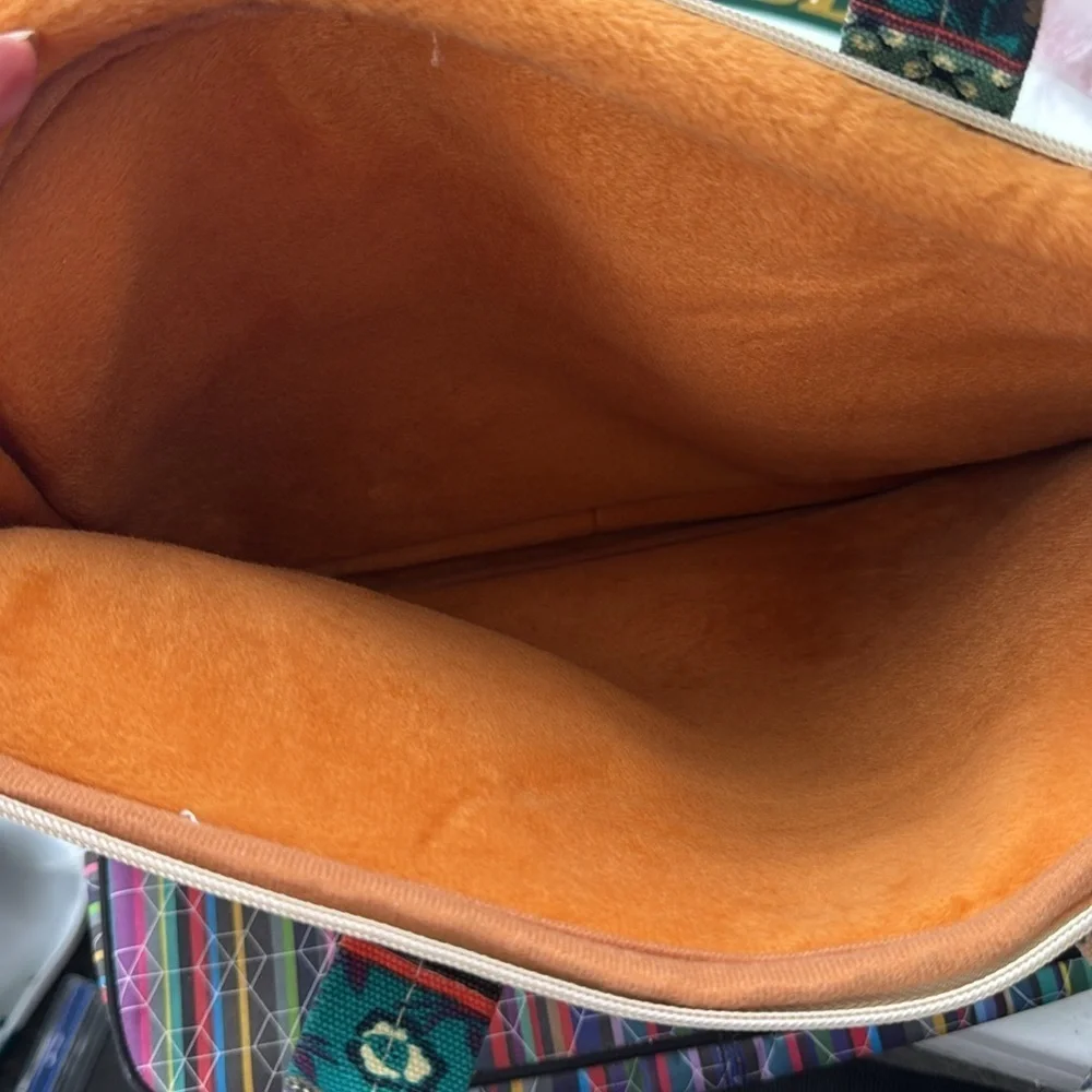 Kinmac bohemian vibe fabric multi pocketed zipper closure laptop/tablet bag.